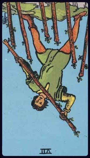 Rider-Waite-Smith tarot card image of the Seven of Wands, reversed.